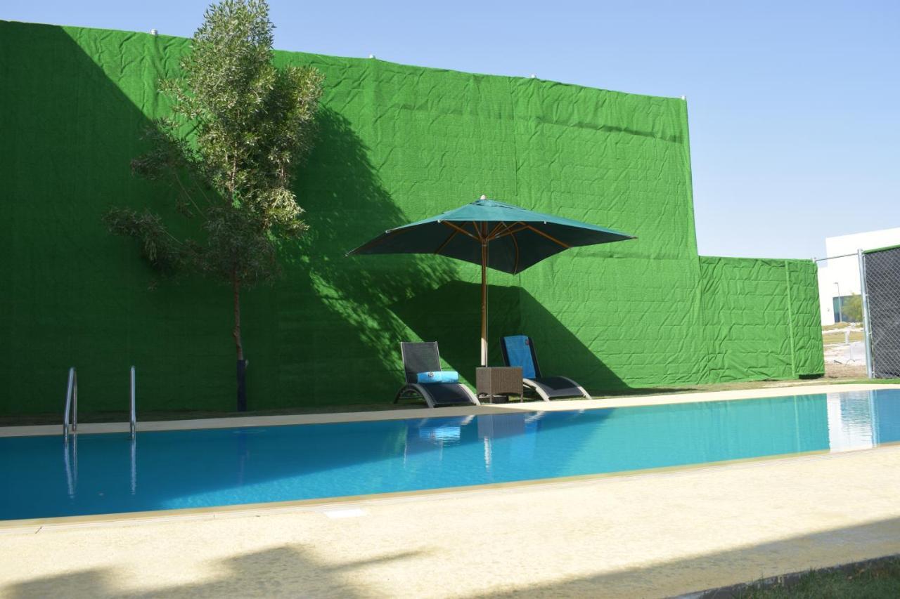 Retaj Salwa Resort & Spa Doha Exterior foto A swimming pool in Spain