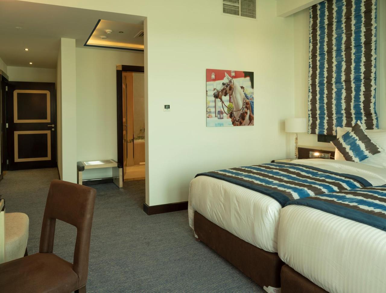 Retaj Salwa Resort & Spa Doha Exterior foto A room at the hotel
